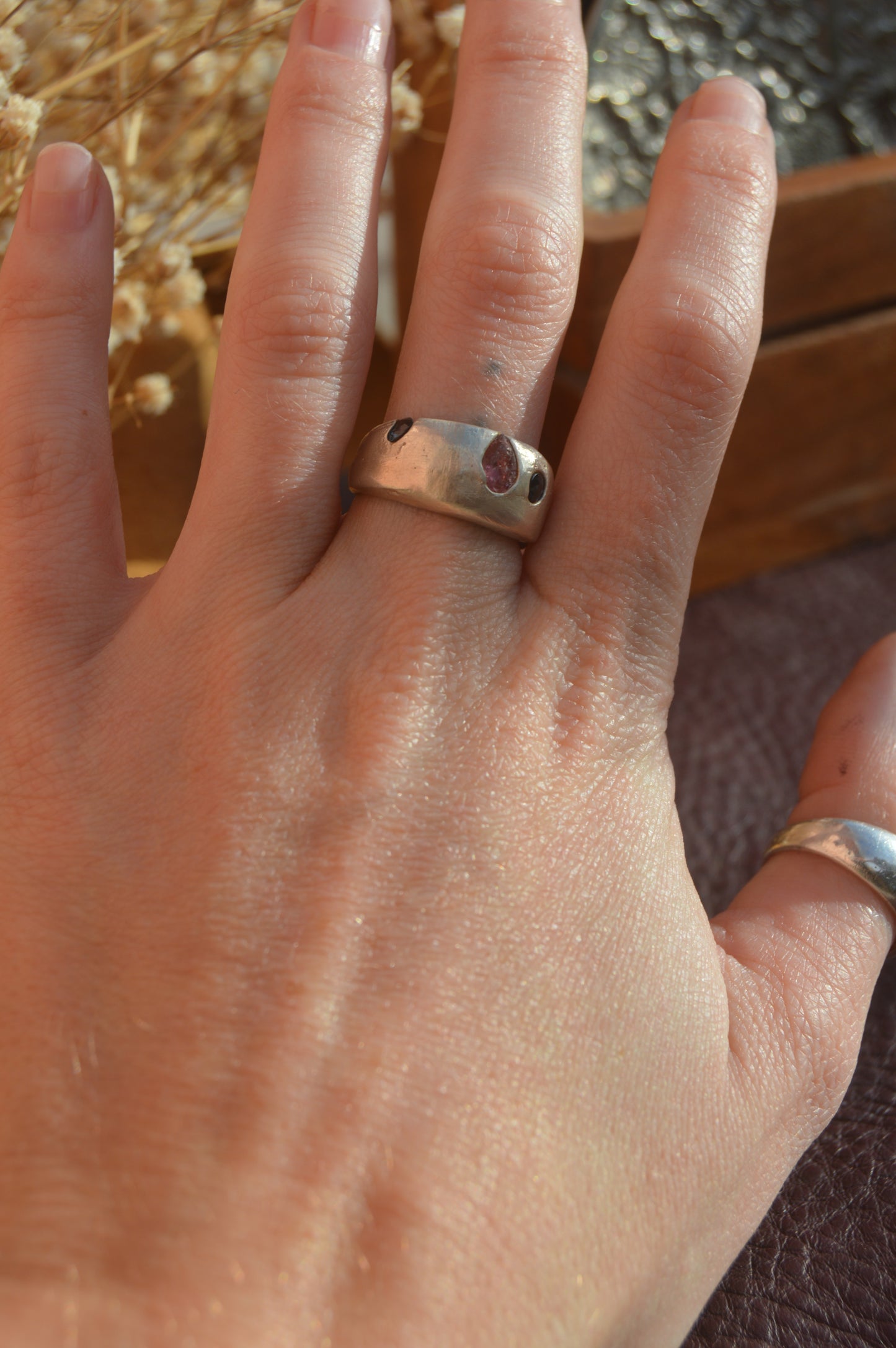 Dome ring with blue sapphires and rough cut garnet size 6